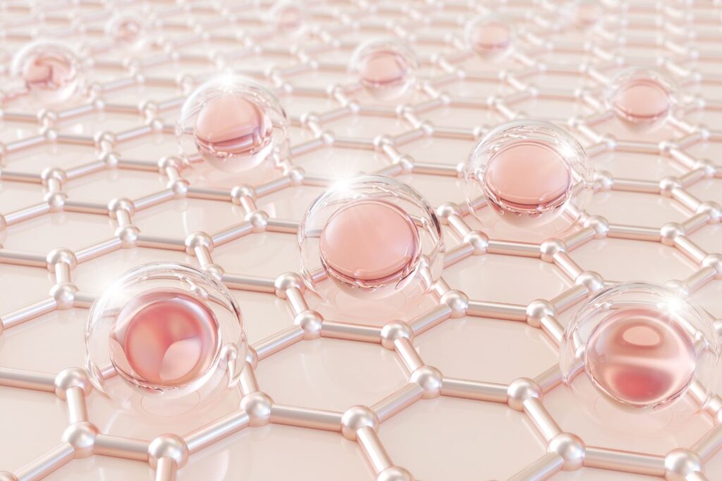 Des alvéoles roses pale avec des bulles en verre pour illustrer l'article peau sèche à la ménopause